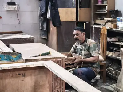 Carpenter building wood drawer